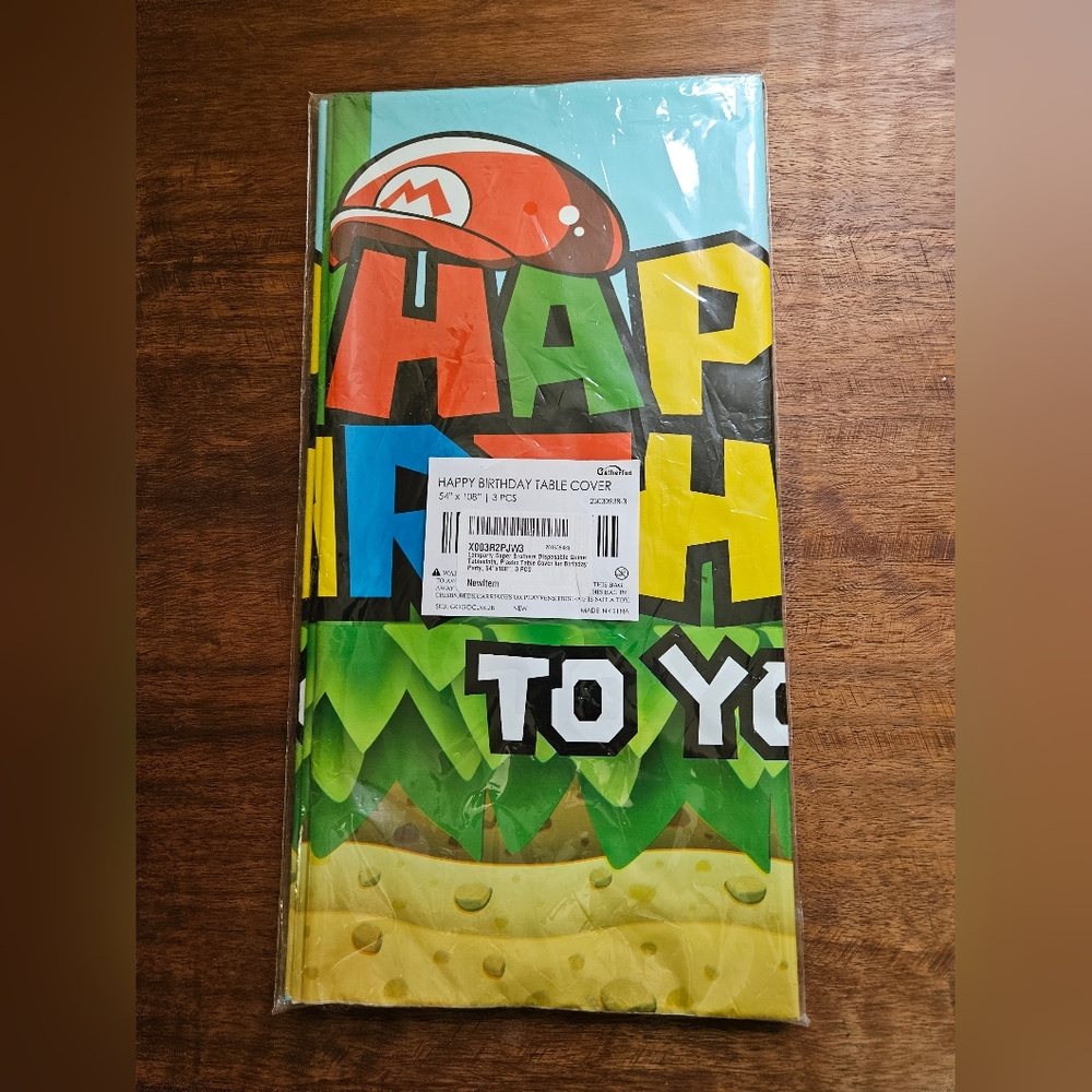 New in the bag 3 pack of Mario birthday plastic table clothes